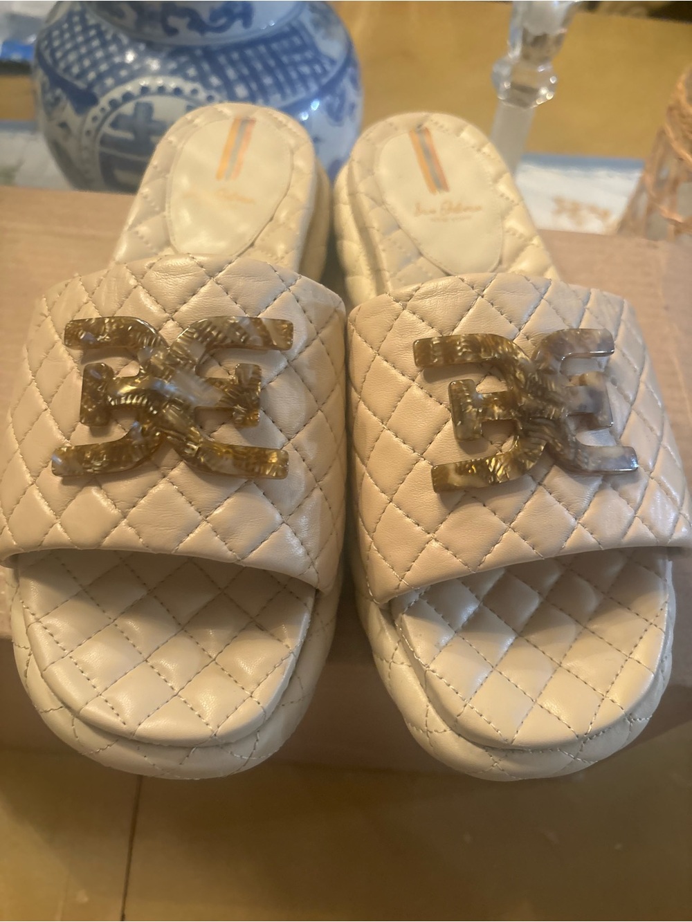 Sam Edelman Quilted Cream Slide Mules with Decorative Resin Emblem